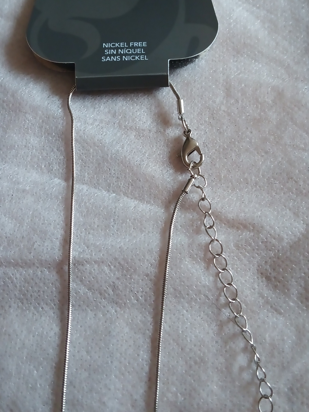 MINICCI SILVER TONE CRYSTAL PENDANT NECKLACE